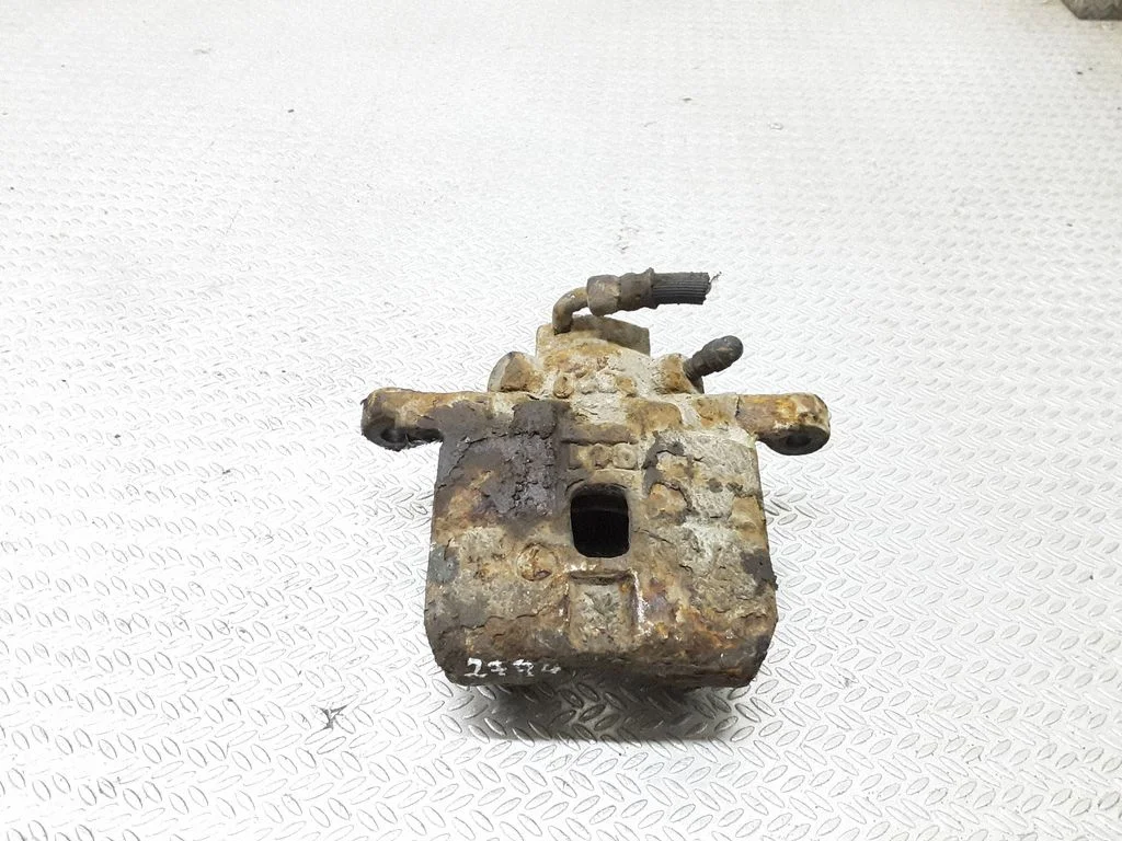 Rear brake caliper – right