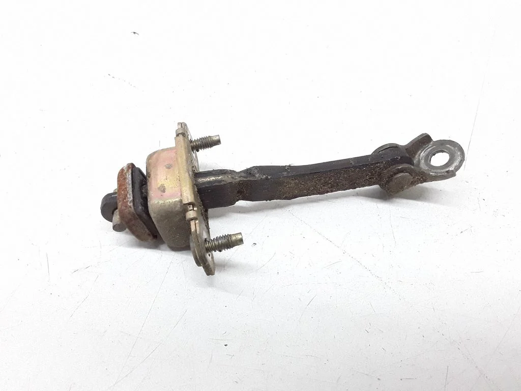 Front door check strap stopper – Subaru Legacy (1999-2003)