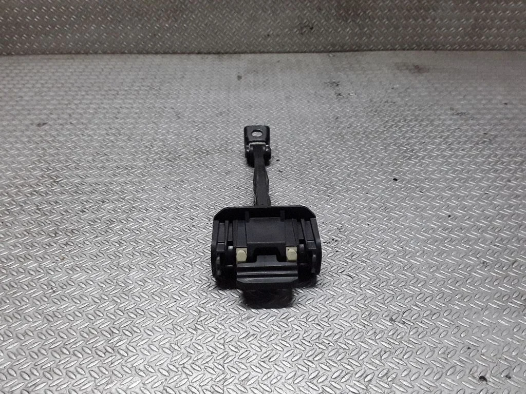 Priekšējo durvju atvēršanas ierobežotājs 7182005