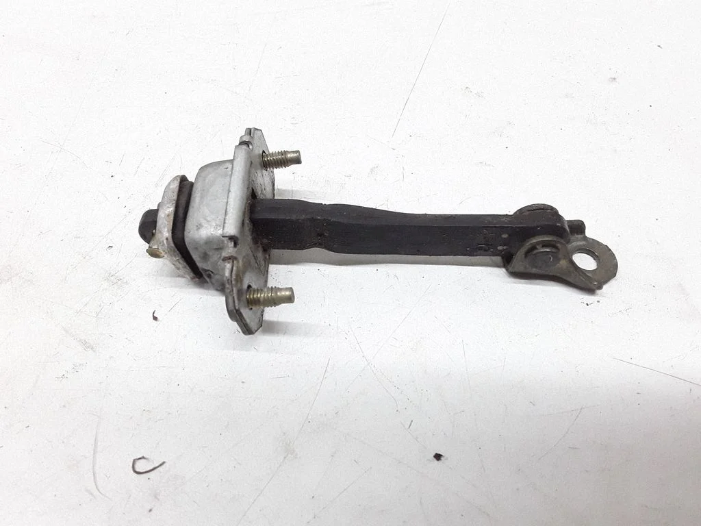 Front door check strap stopper – Subaru Legacy (1999-2003)