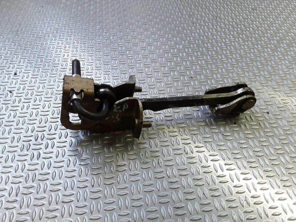 Front door check strap stopper – Saab 9-3 Ver1 (1998-2005)