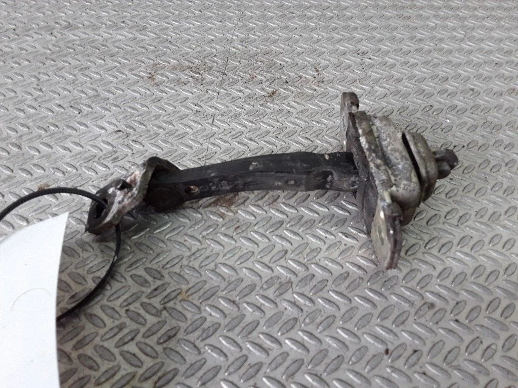 Front door check strap stopper – KIA Rio (2001-2005)