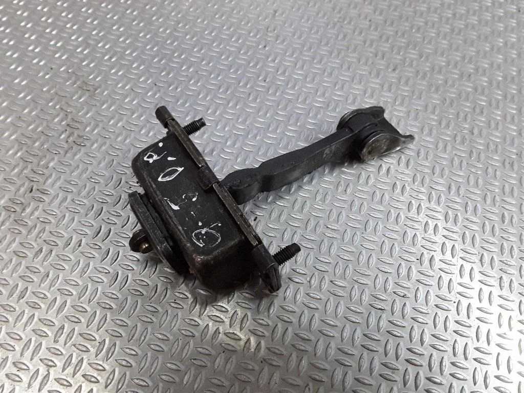 Front door check strap stopper – Saab 9-5 (1998-2005)