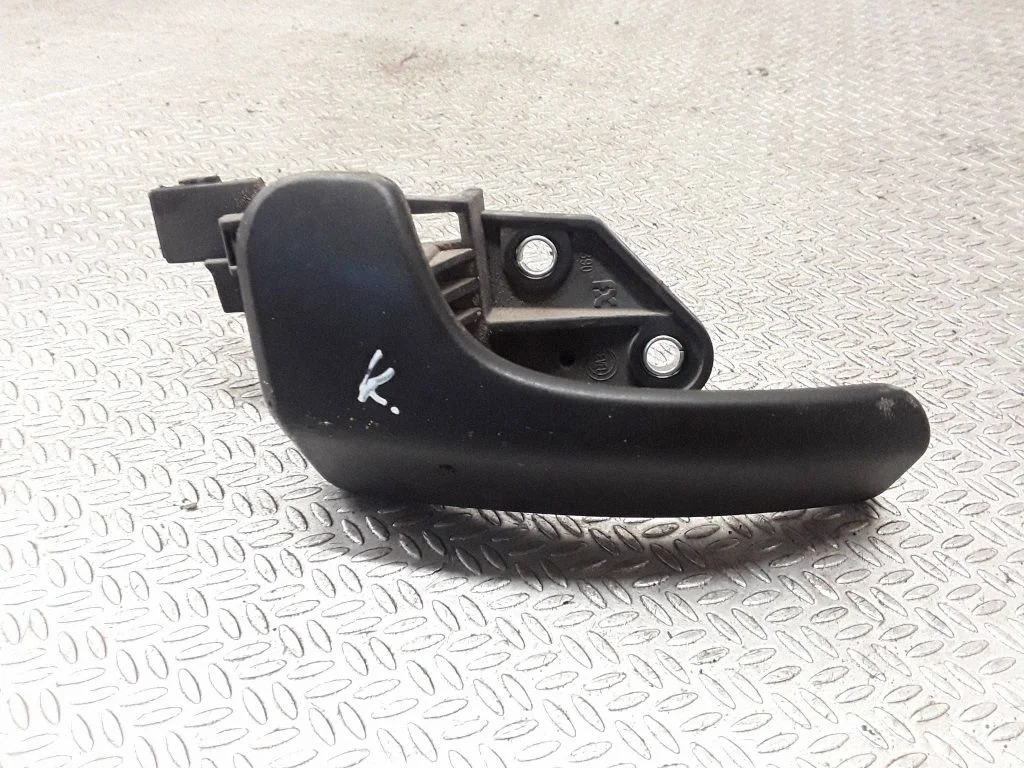 Front door interior handle – left