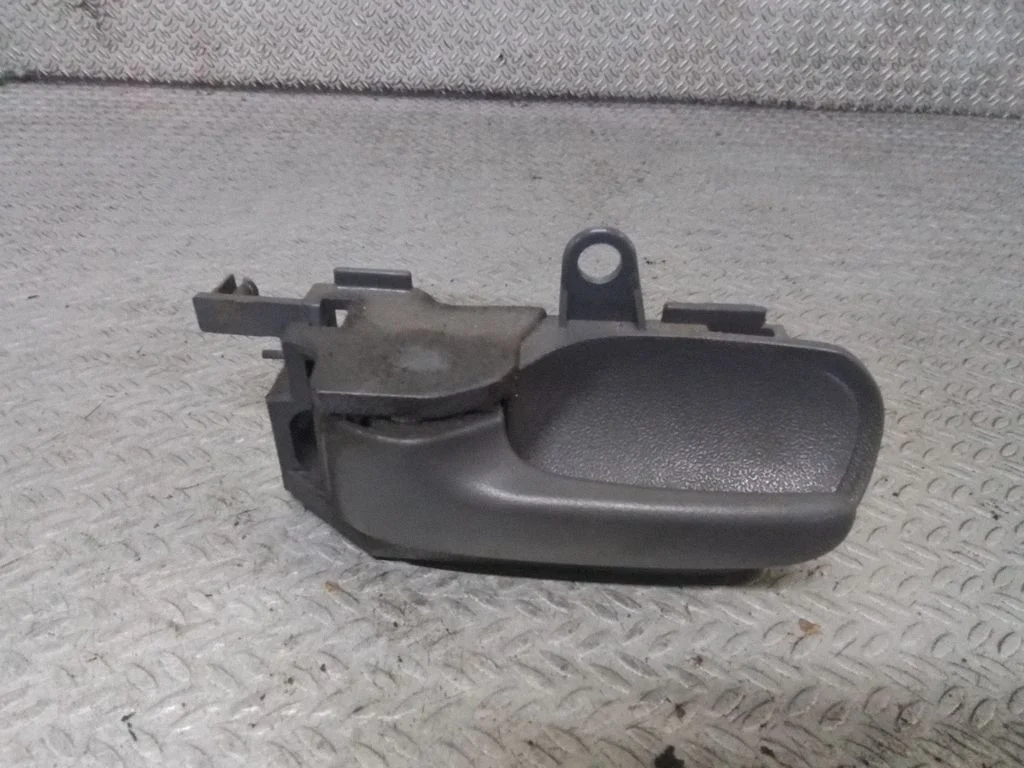 Front door interior handle – left
