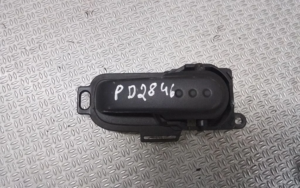 Front door interior handle – Nissan Micra (2003-2007)