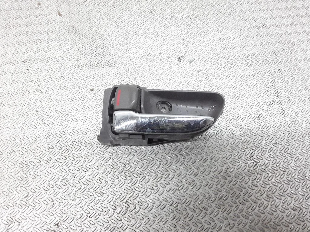 Front door interior handle – left