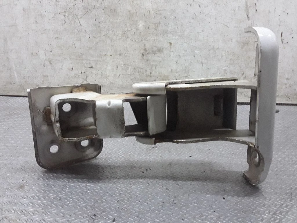 Rear door upper hinge – right