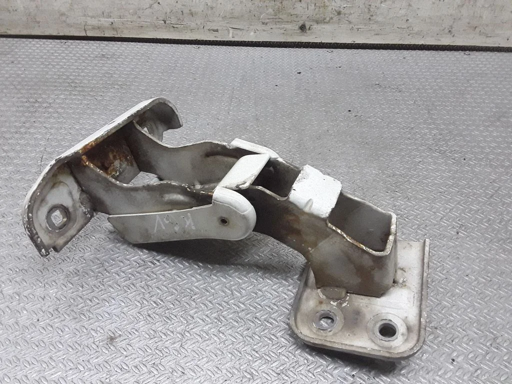 Rear door upper hinge – left