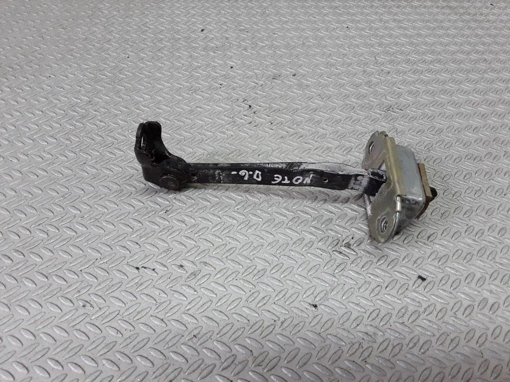 Rear door check strap stopper – Nissan Note (E11) (2006-2014)