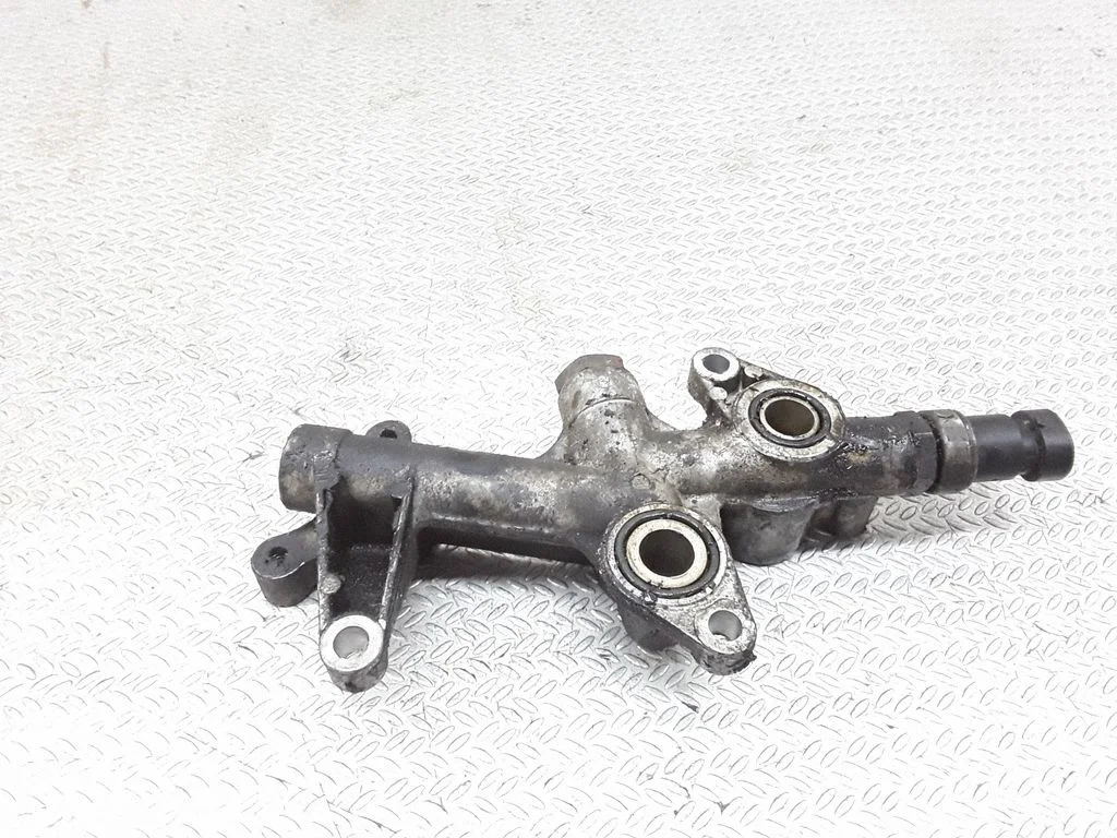 Oil filter mounting bracket – Saab 9-3 Ver2 (2003-2007)