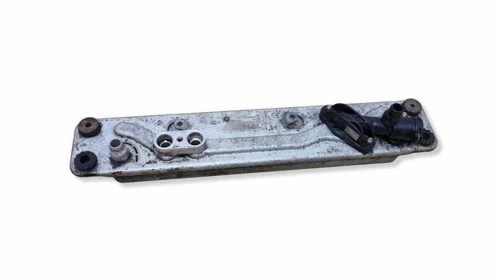 Gearbox / Transmission oil cooler 7553389