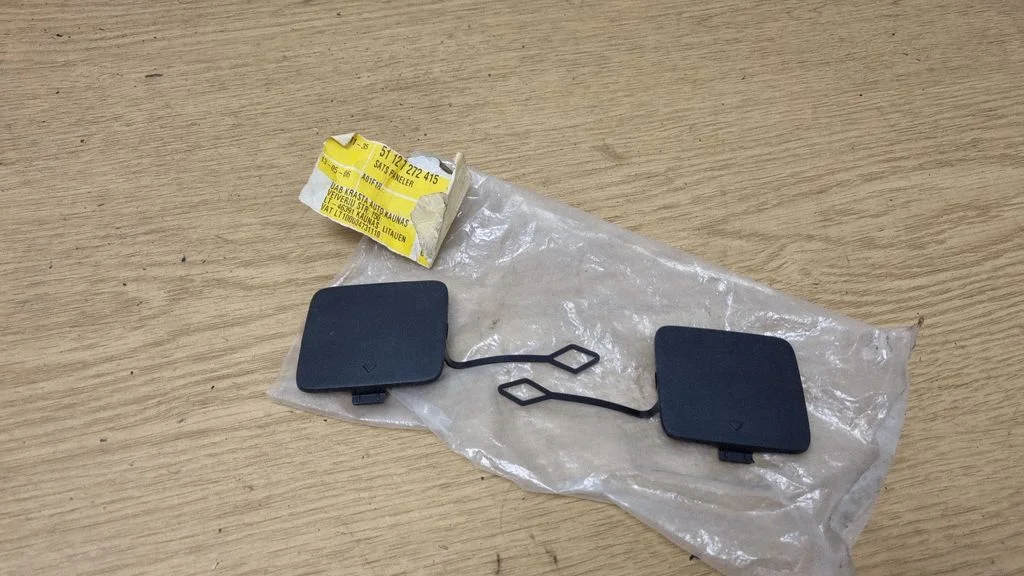 Aizmugurējais vilkšanas cilpas vāciņš 7230182