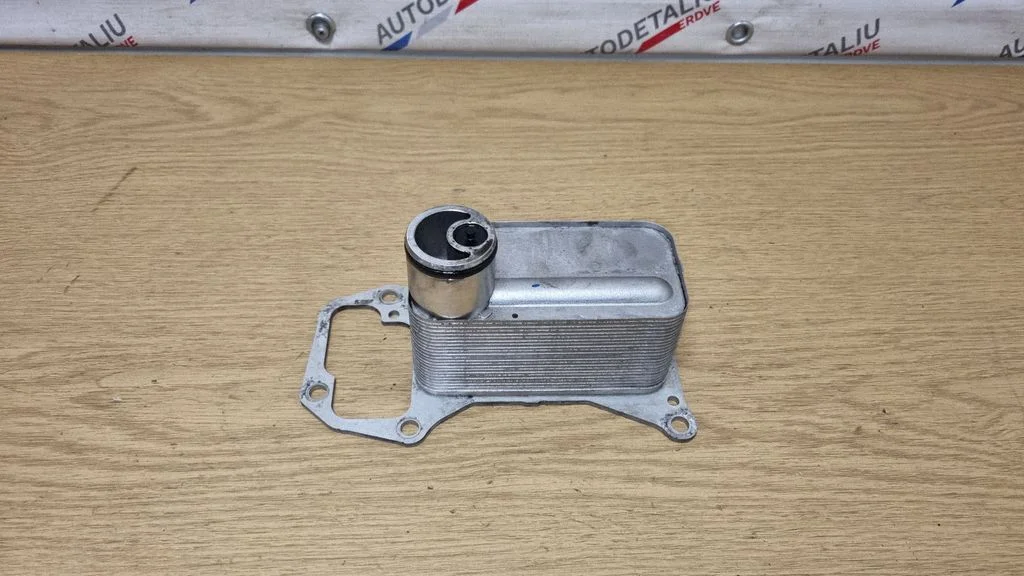 Oil filter mounting bracket 8512435
