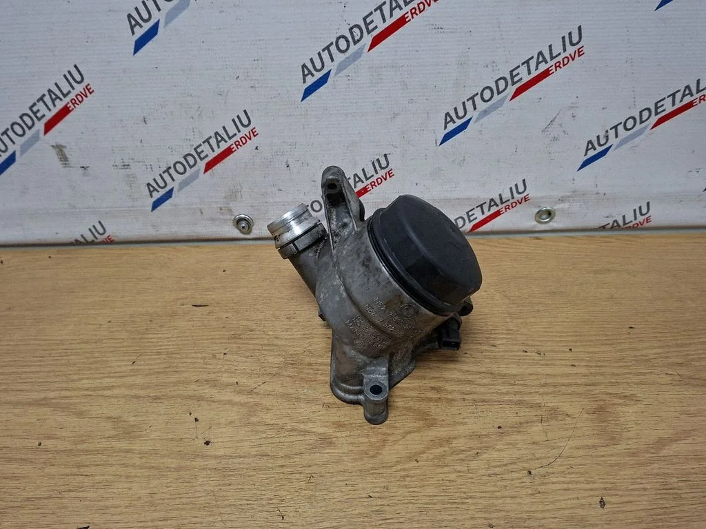 Oil filter mounting bracket 7516383