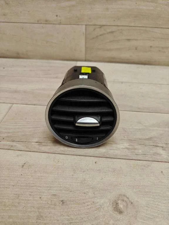Dash center air vent grill