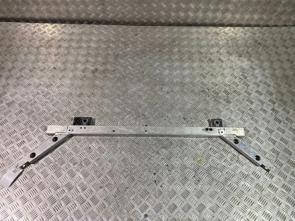 Top upper radiator support slam panel