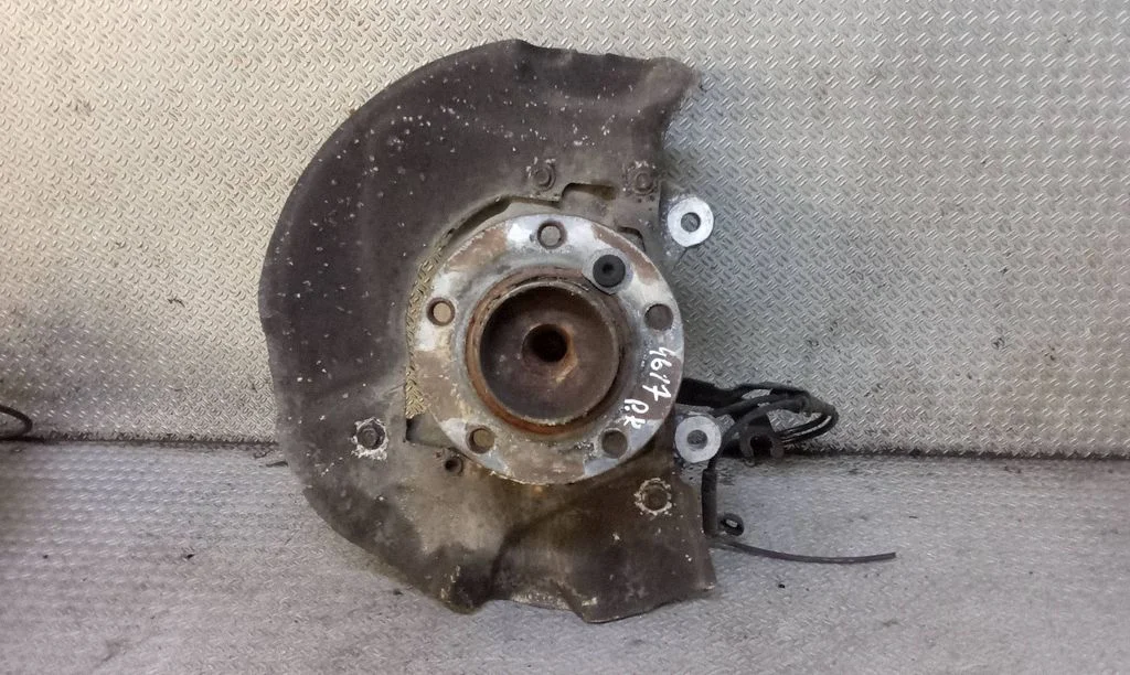 Front wheel hub spindle knuckle – left
