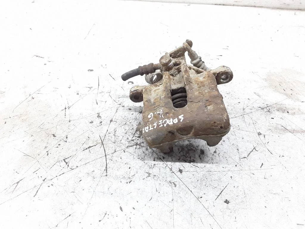 Rear brake caliper – left