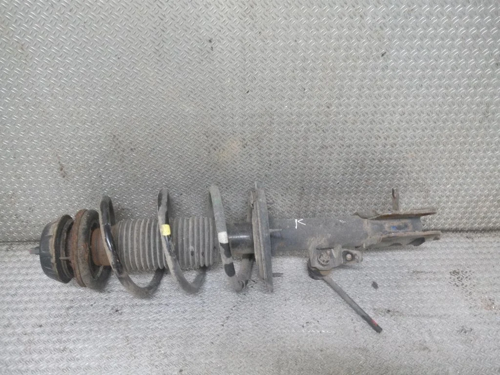 Front shock absorber with coil spring