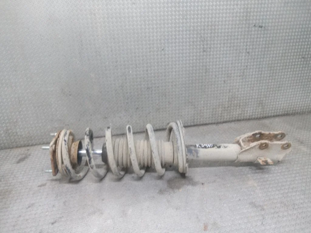 Front shock absorber with coil spring