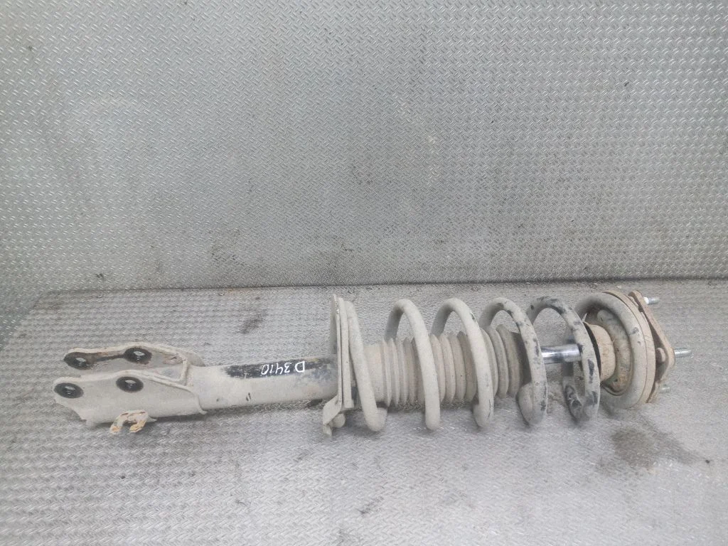 Front shock absorber with coil spring