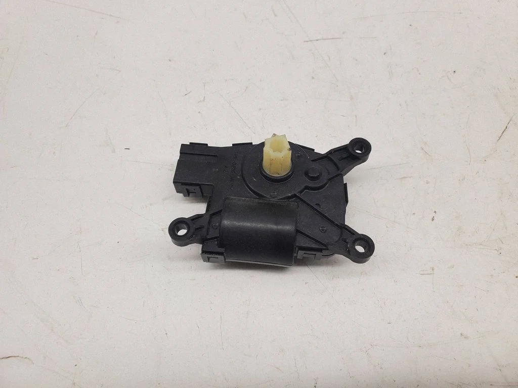 Silniczek klapki nawiewu L1MH19E616CD