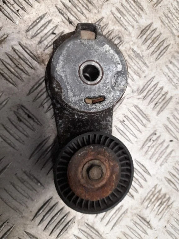 Generator/alternator belt tensioner