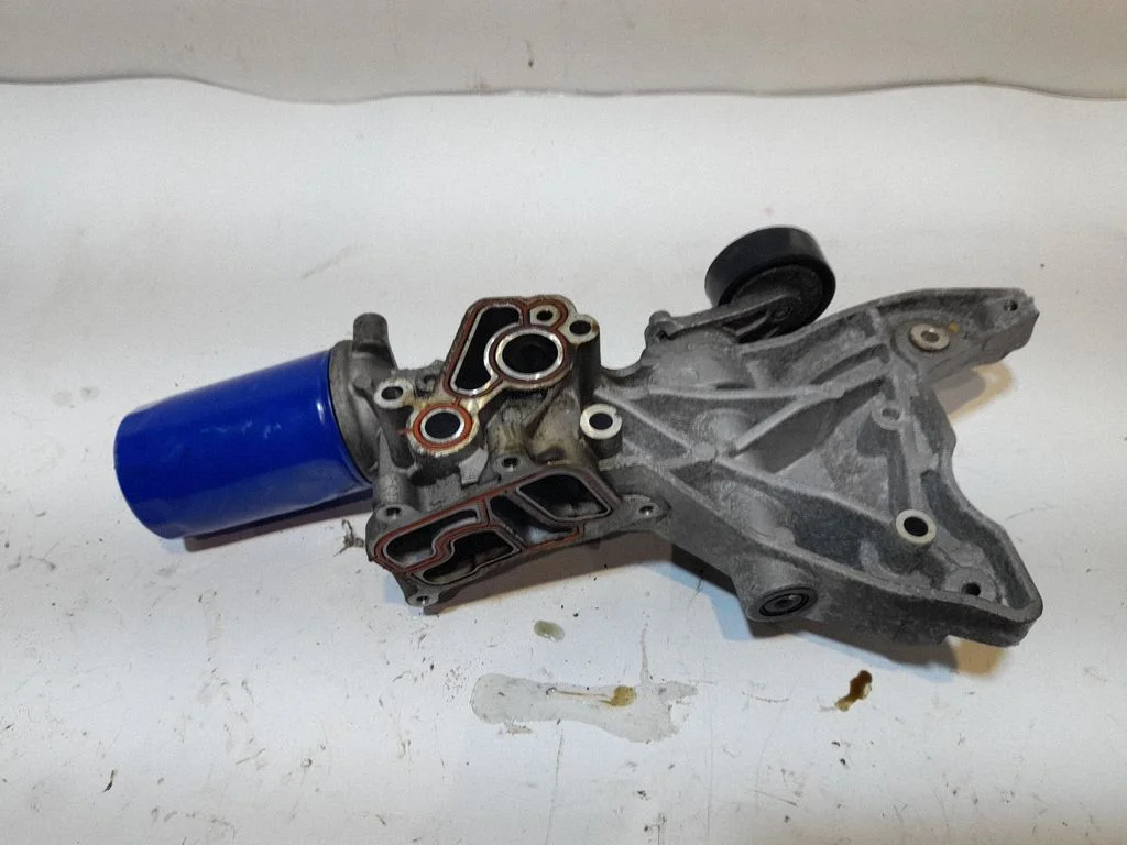 Generator/alternator bracket 06J903143AG