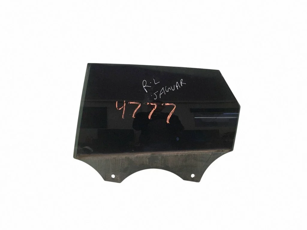 Rear door window glass – left