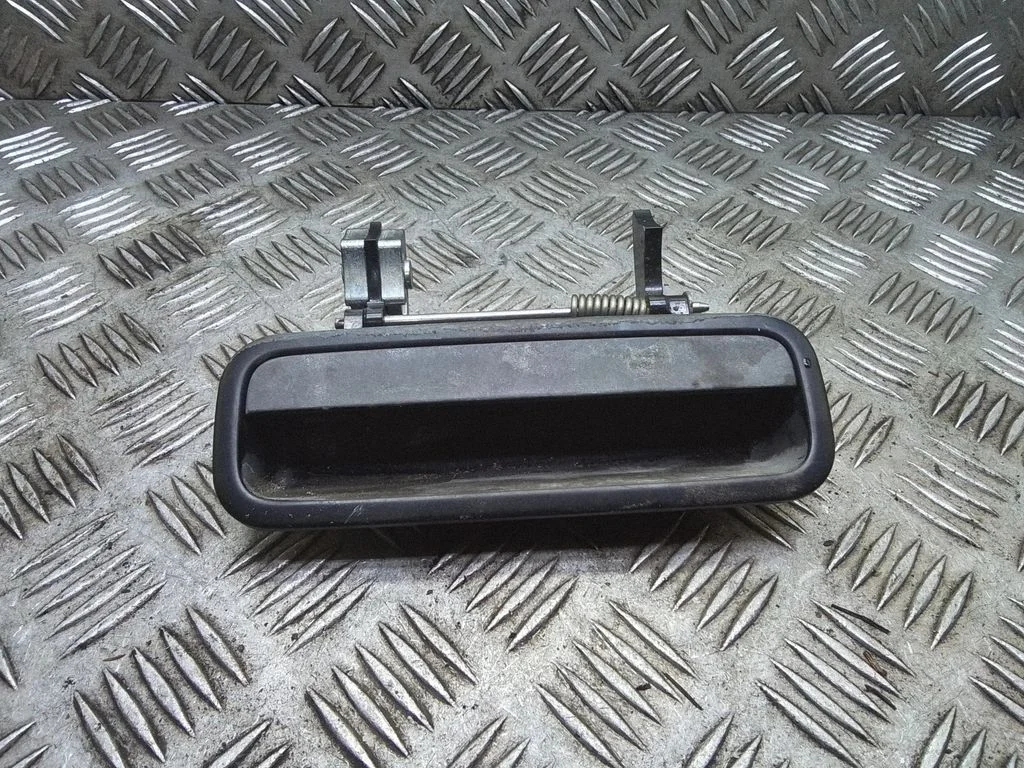 Aizmugurējā vāka atvēršanas rokturītis (ārējais) 1J0973332