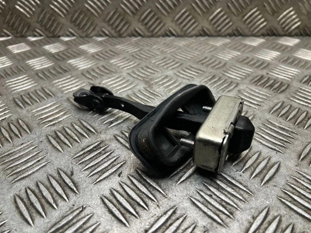 Rear door check strap stopper XFARR