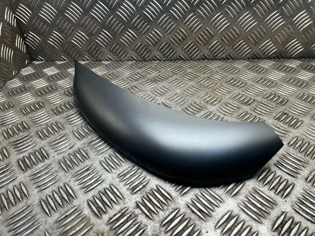 Cita centrālās konsoles (tuneļa) detaļa 9801830