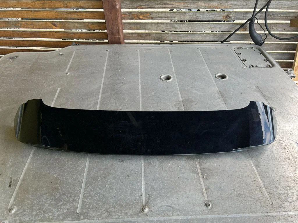 Tailgate/trunk spoiler 7687647010