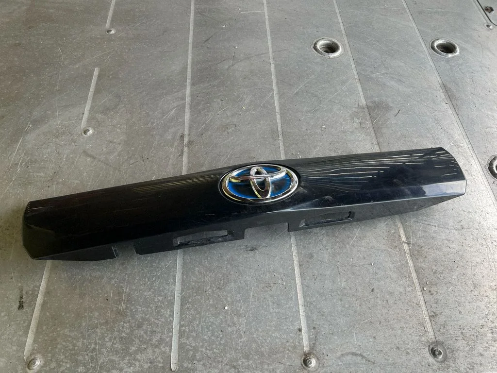 Trunk door license plate light bar 7680147140