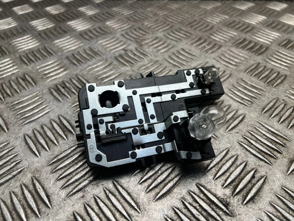 Tail light bulb cover holder – Opel Astra K (2015-2021)