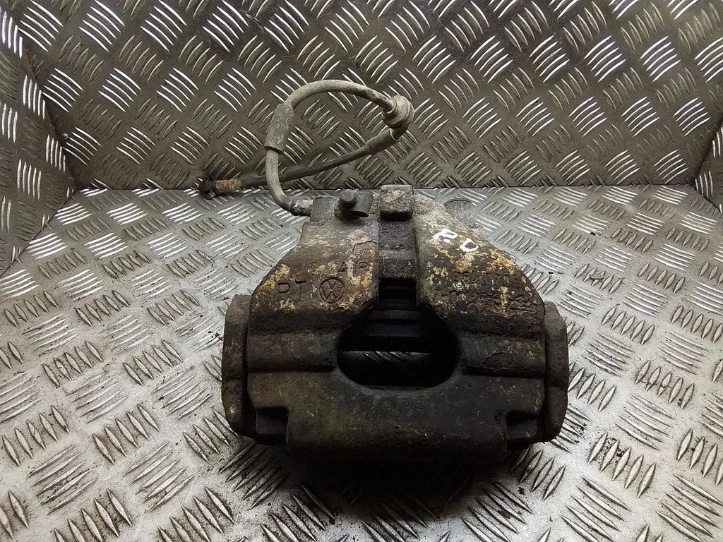 Front brake caliper – right