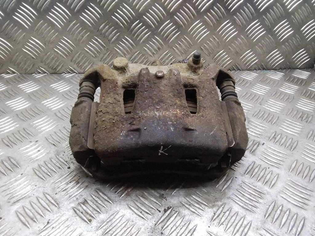 Front brake caliper – Nissan Leaf I (ZE0) (2010-2017)