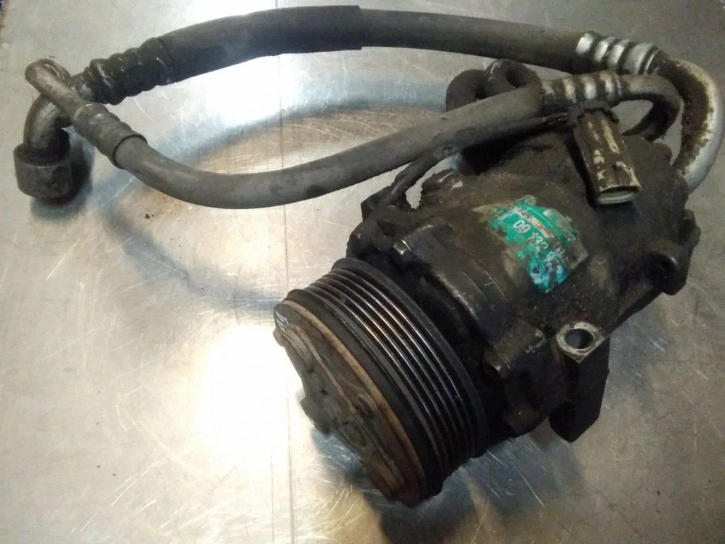 Air conditioning (A/C) compressor (pump) – Opel Astra G (1998-2009)