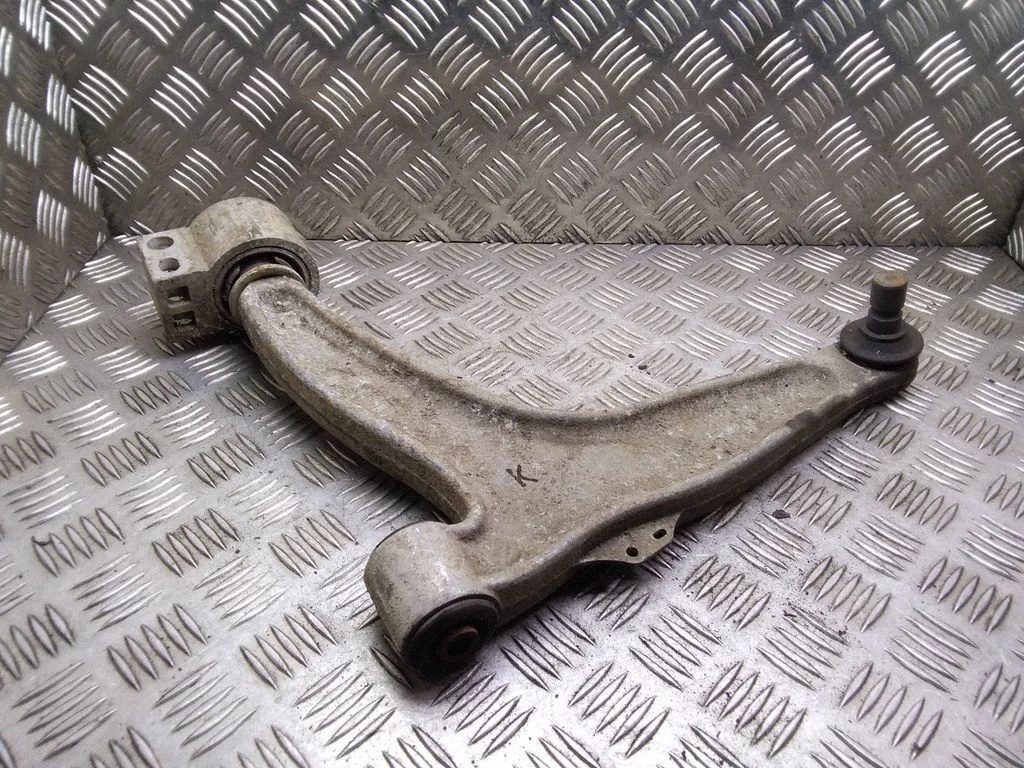 Front lower control arm/wishbone – left