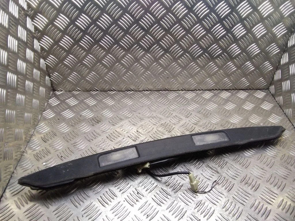 Trunk door license plate light bar – Subaru Legacy (2004-2006)