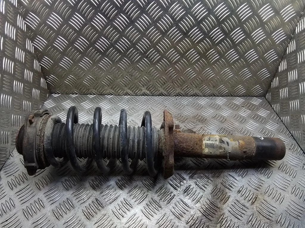 Front shock absorber with coil spring – Volkswagen Touran I (2003-2010)