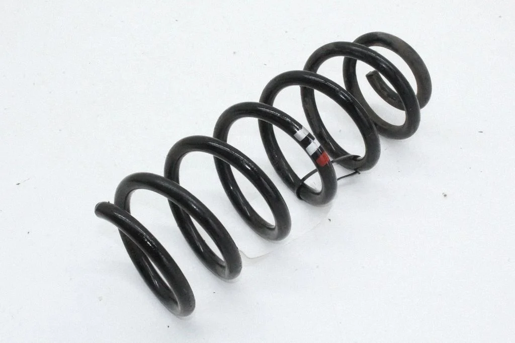Front coil spring – left