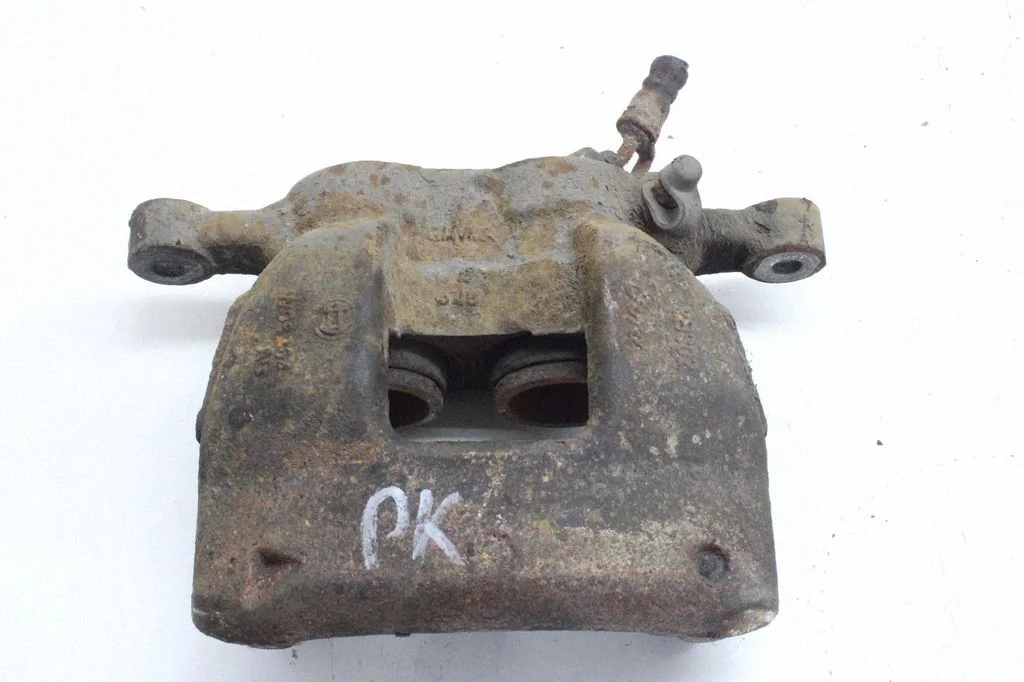 Front brake caliper – left