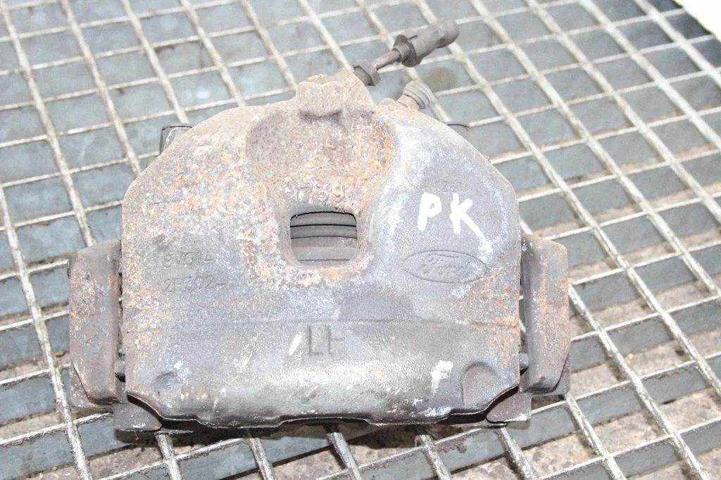 Front brake caliper – left