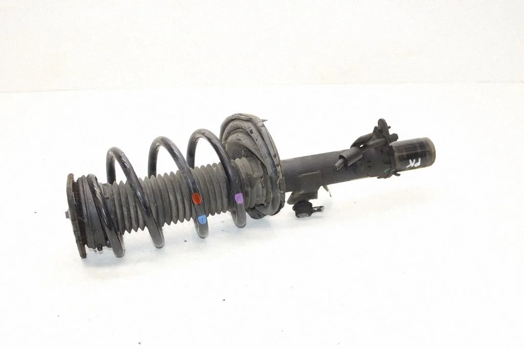 Front shock absorber/damper – left