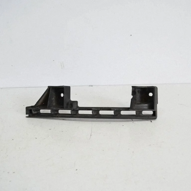 Headlight/headlamp mounting bracket – Volkswagen Caddy (2004-2010)