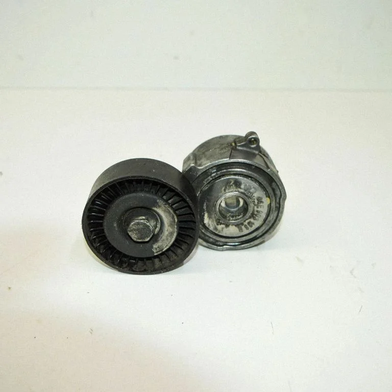 Napinacz paska 06E903133R