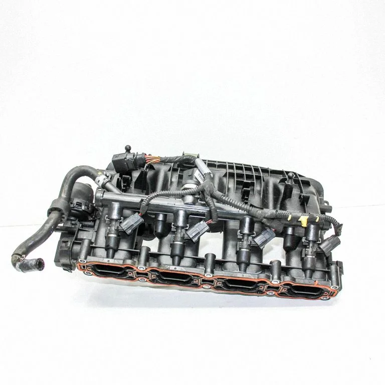 Kolektor ssący 06K133201Q