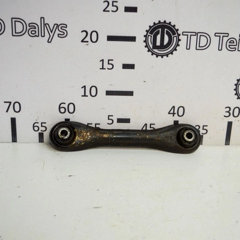 Rear upper control arm/wishbone – left